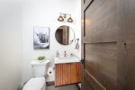 The home has one powder room to service the main living space.